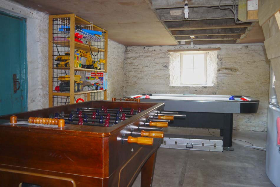 A games room stocked with games for the kids