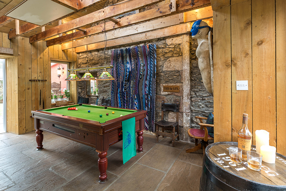 A Leisure Room with airhockey, pool table and sauna
