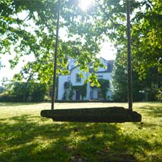 children swing at country holiday house