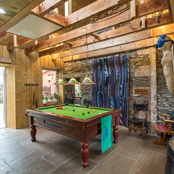 A Leisure Room with airhockey, pool table and sauna