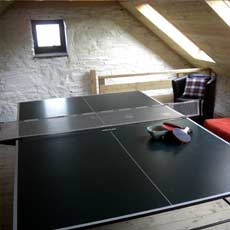 A gaming deck with ping-pong table for house guests
